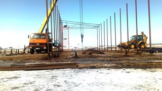 Аренда экскаватора погрузчика с ямобуром в Октябрьский цена от 1578 руб